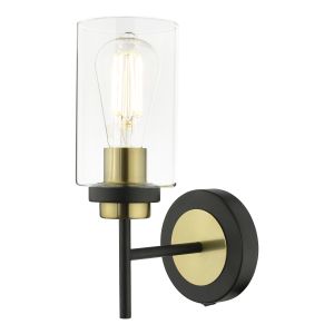 Abel 1 Light E27 Satin Black Wall Light With Satin Brass Accents C/W Clear Cylindrical  Glass Shade With Rocker Switch